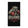 A black rectangular towel or mat featuring a graphic of an English bulldog boxer with red boxing gloves and the text 'BOSHINO EST. 2026' in distressed white and red lettering.
