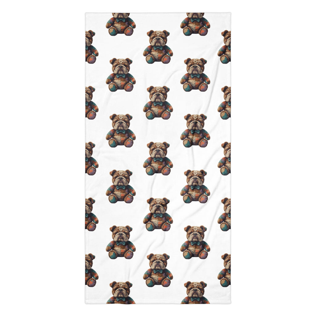 A white rectangular towel featuring a repeating pattern of small brown teddy bears with colorful accents, shown flat against a white background.